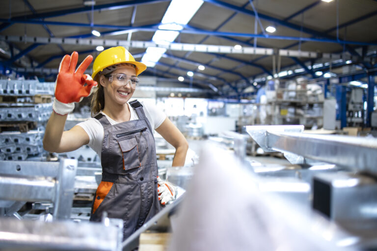 Працівник/працівниця виробництва portrait female factory worker showing okay sign 2
